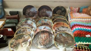 A quantity of collectors plates of Tigers, Lions etc