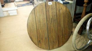 A large wooden lid