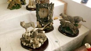 3 wolf figurines