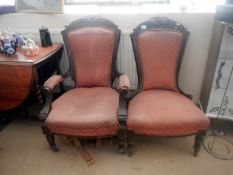 A ladies and gents Edwardian armchairs