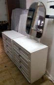 A white melamine dressing table and chest of drawers