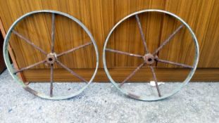 A pair of metal wheels