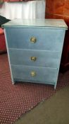 A 3 drawer draylon chest of drawers