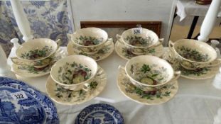 A set of Royal Doulton soup bowls and plates