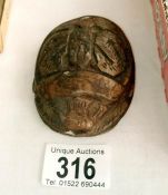 An old carved scarab