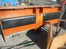 A 1960s teak double head board