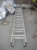 A long metal extending ladder