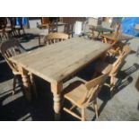 A antique pine table and 4 chairs