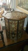 A mother of pearl inlaid table