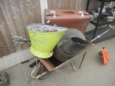 A wheelbarrow, metal milk urn, metal bucket, suitcase etc