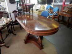 A large oval dining table