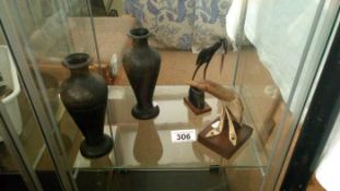 2 ebony vases and 2 bone items