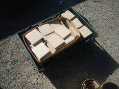 A green box of tiles