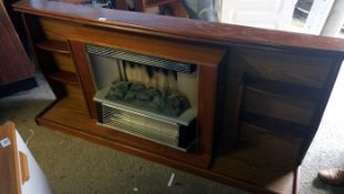 A large teak 1960s fire surround and fire
