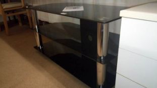 A large glass black TV stand