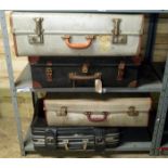 4 vintage suitcases