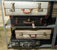 4 vintage suitcases
