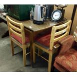 A 1960s table and set of 4 chairs