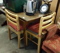 A 1960s table and set of 4 chairs