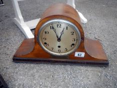 A mantel clock (missing glass)