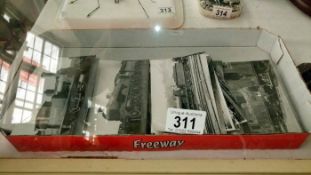 A quantity of old railway postcards