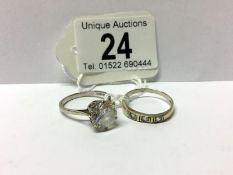 A 9ct white gold ring with white stone and a 9ct gold ring with stones,