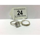 A 9ct white gold ring with white stone and a 9ct gold ring with stones,