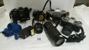 A Minolta X-300 Chinon CE-5 and Praktic cameras,