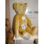 A boxed Steiff 1908 gold teddy bear,