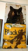 A distressed tobacco enamel sign for black cat cigarettes
