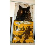 A distressed tobacco enamel sign for black cat cigarettes