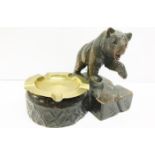 A Black Forest carved bear ashtray