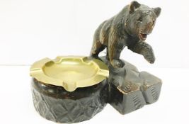 A Black Forest carved bear ashtray