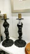 A pair of spelter cherub table lamps