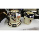 An old imari pattern teapot and jug