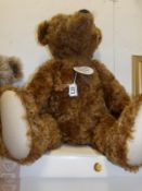 A boxed 70cm Steiff teddy bear,