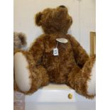 A boxed 70cm Steiff teddy bear,