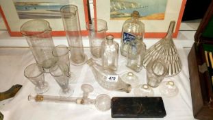 16 pieces of early 20th century chemists glassware with an ivory cut throat razor