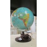 A 1972 desk lamp globe produced by Scan-globe,