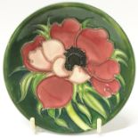 A boxed Moorcroft Anemone tribute pin dish