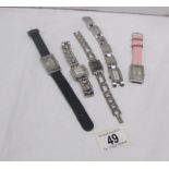 5 wristwatches including Gucci,