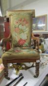 A mahogany armchair with tapestry seat & back