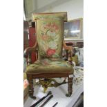 A mahogany armchair with tapestry seat & back