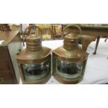 A pair of copper port and starboard ships lamps