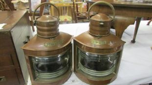 A pair of copper port and starboard ships lamps