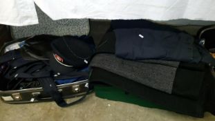 A crate & case of railway uniforms, shirts, ties & great coat etc.
