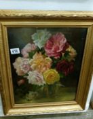 A still life of flowers on board signed Catherine Dearne
