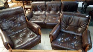 A 1970's 3 piece suite with foot stool