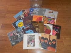 A box of approximately 60 progressive and classic rock LP's including Moody Blues, Beatles,