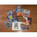 A box of approximately 60 progressive and classic rock LP's including Moody Blues, Beatles,